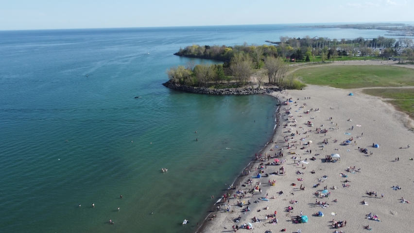 4K Aerial view of woodbine beach Toronto, ON, Canada. Taken on a hot summer day in Toronto using dji mini 2 drone.  Royalty-Free Stock Footage #1091163193