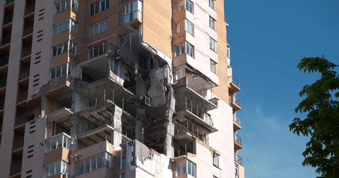 UKRAINE, KYIV, MAY 11, 2022: Russian missile damaged multi-storey dwelling building in Kiev city on February 26, 2022. Russian aggression. War in Ukraine. Terror and genocide of Ukrainian people