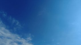 Blue sky white clouds. Puffy fluffy white clouds. Cumulus cloud cloudscape timelapse. Summer blue sky time lapse. Nature weather blue sky. White clouds background. Cloud time lapse , video loop