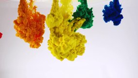 Deep multi-colored paint jets flow in clear water on white background. Bright colors create decorative abstract background slow motion macro, rainbow colors, lgbt - Powered by Shutterstock - Get 15% off with code: PIKWIZARD15
