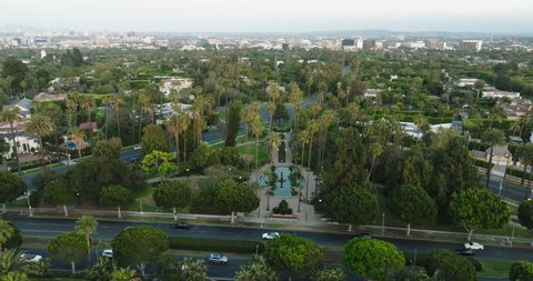 Beverly Hills , CA , United States - 06 06 2022: Flying Over Beverly Hills Intersection, Drone Footage of Iconic Upscale Neighborhood in Los Angeles