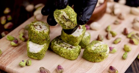 fresh turkish delight with crushed pistachios and chocolate, show fresh turkish delight with green pistachios