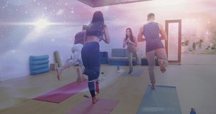 Animation of zodiac sign over diverse group of people practicing yoga. Horoscope, yoga meditation concept digitally generated video.