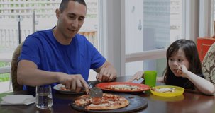 Animation of pizza icons over caucasian father with daughter eating pizza. National pizza month and digital interface concept digitally generated video.