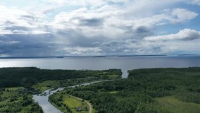 Timelapse video flight to Lake Onega with a magnificent view of the water and clouds of Karelia