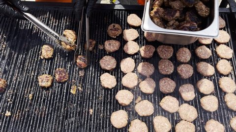 Delicious Meatball Cooking on a Barbecue