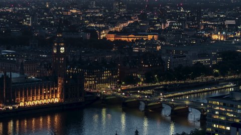 Establishing Aerial View Shot of London UK, United Kingdom, Big Ben, Westminster Bridge and Whitehall, close view, at night evening