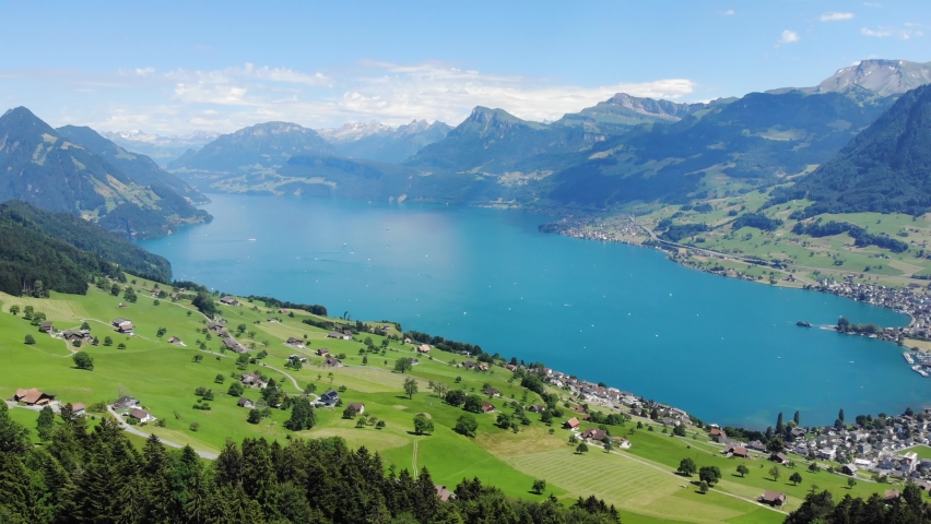 Aerial reveal view of Lake Lucerne (Vierwaldstättersee) and the Swiss Alps Royalty-Free Stock Footage #1091270067