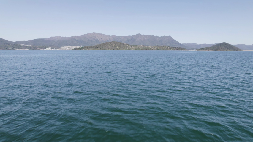 Aerial shot of Tolo Harbor with Pak Sin Lang as background at sunny day