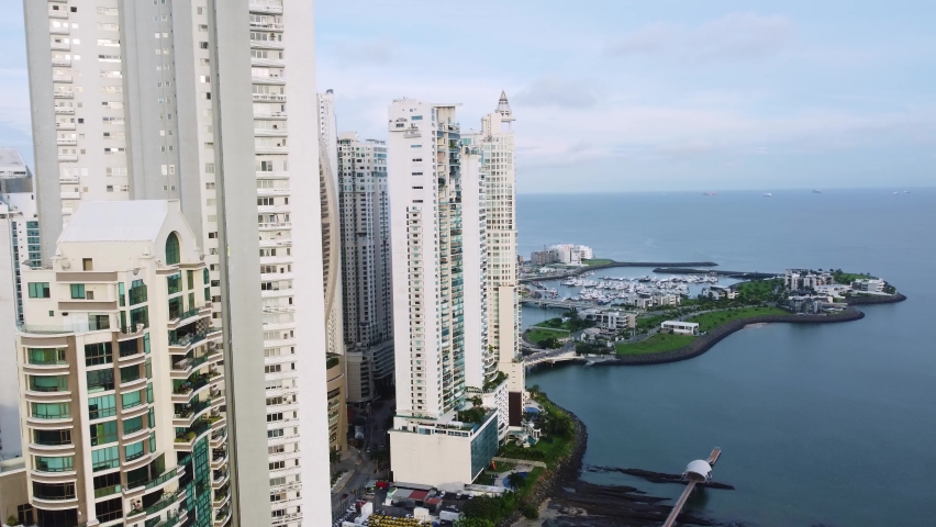 Panama city: Aerial drone footage of luxury condominium towers in the  Punta Pacifica by the Pacific ocean in Panama in Central America with the Ocean Reef Island Marina in the background. Royalty-Free Stock Footage #1091274521