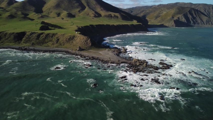Flying towards tongue point, Wellington south coast, New Zealand Royalty-Free Stock Footage #1091275957