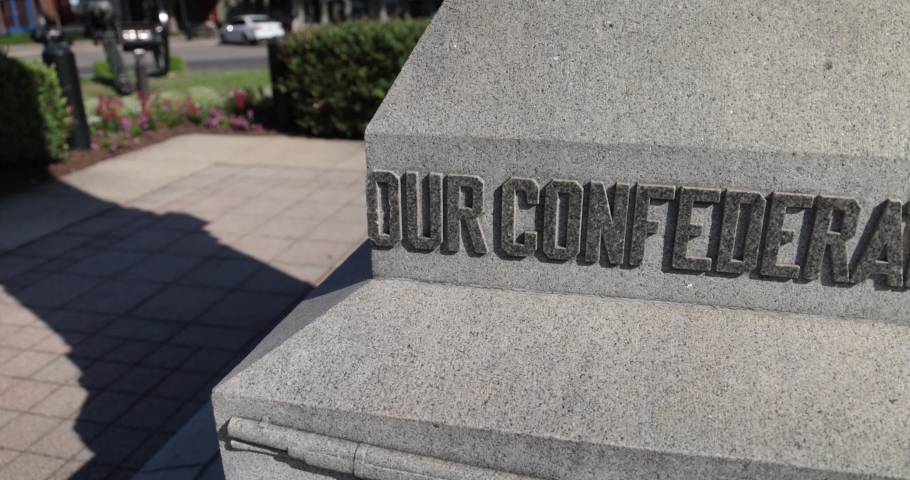 Our Confederate Soldiers on base of statue in Franklin, Tennessee with pan video in slow motion.