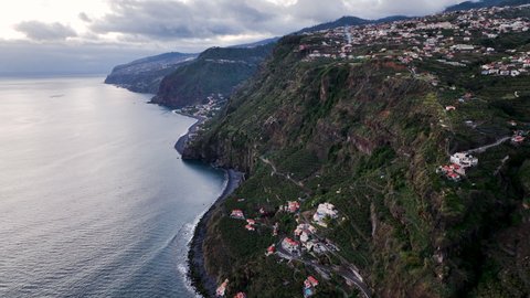 Impressive terraced farming on steep cliffside, Cascata dos Anjos, Madeira