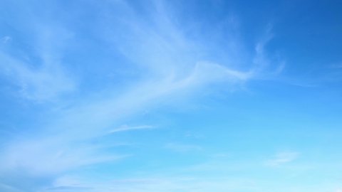 4K Sky Time lapse, Clear very nice soft blue sky, white rolling, fast motion timelapse cloud base clouds in horizon, Beautiful cloud space weather beautiful blue sky background.
