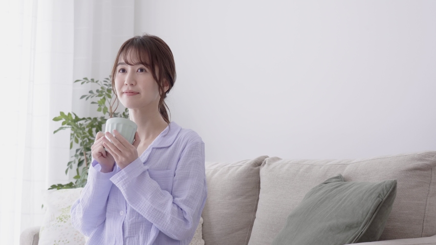 Asian woman relaxing in the room