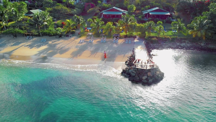 St Lucia Caribbean, couple men and women on vacation,Huge pitons drone view at Saint Lucia sugar beach St Lucia mountains at the beach with clear ocean Royalty-Free Stock Footage #1091319119