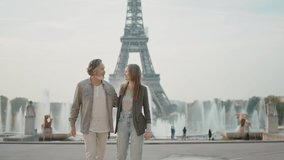 Happy senior couple in Paris. Senior woman and man spending time together at the eiffel tower. Concept about european tourism and landmarks - Powered by Shutterstock - Get 15% off with code: PIKWIZARD15