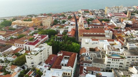 Cartagena, Colombia: Aerial drone footage of the famous Cartagena de Indias colonial old town with the Palace of the Inquisition, the cathedral and the Plaza de Bolivar in Colombia, South America