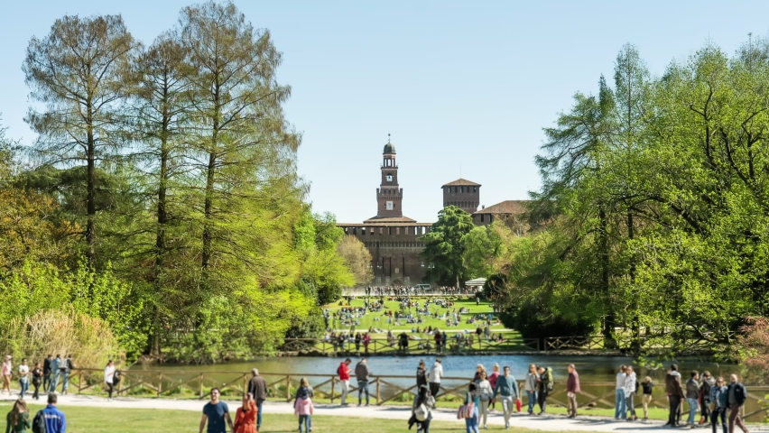 Parch Sempion with lush green trees and river in Milan