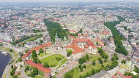 Inscription on video. Krakow, Poland. Wawel Castle. Ships on the Vistula River. View of the historic center. Text furry, Aerial View, Point of interest