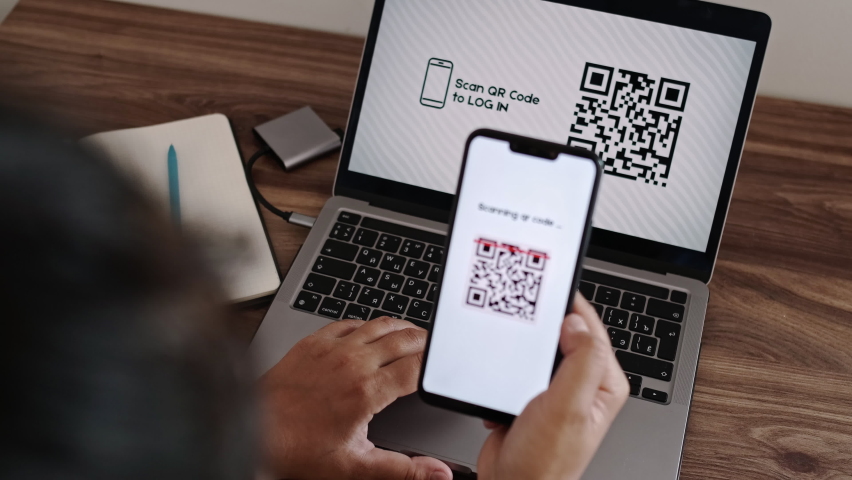 Log In Web Page Using Smartphone with QR Code Scanning Application. Verification or Autentification with Bar Code Reader. Synchronously Successful Approval on Laptop and Mobile Phone. CloseUp VIew.  | Shutterstock HD Video #1091335307