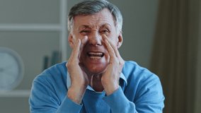 Close-up funny old caucasian man grandfather elderly 60s businessman mature senior boss looking at camera holding hands near mouth like bullhorn yelling screams talking loudly, bad hearing problems - Powered by Shutterstock - Get 15% off with code: PIKWIZARD15