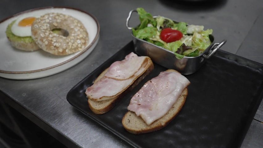 Serving Breakfast in Restaurant Kitchen, Chef with Black Gloves