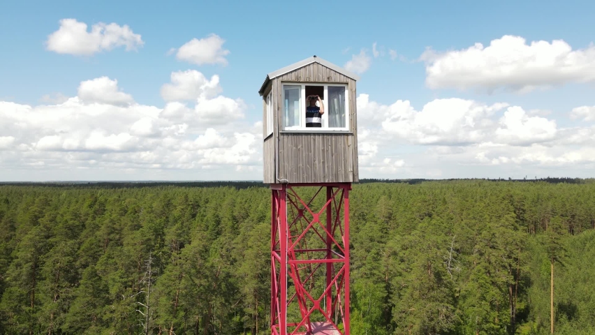 Lookout tower in the woods. Fire tower in the woods