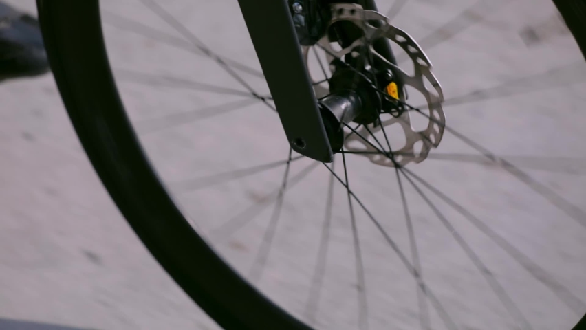 Close up of bicycle's wheel spinning