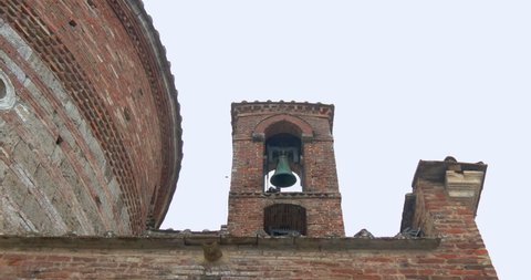 Bells ringing in the bell tower of the Italian romanic abbey, with sound