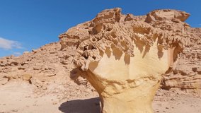 Mushroom Shaped Rock Standing Beside Red Sandstone Rockface In Desert, Egypt - Powered by Shutterstock - Get 15% off with code: PIKWIZARD15