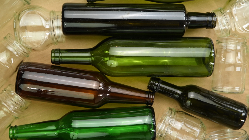 Glass bottles and jars ready for recycling, top view, rotating	 | Shutterstock HD Video #1091385017