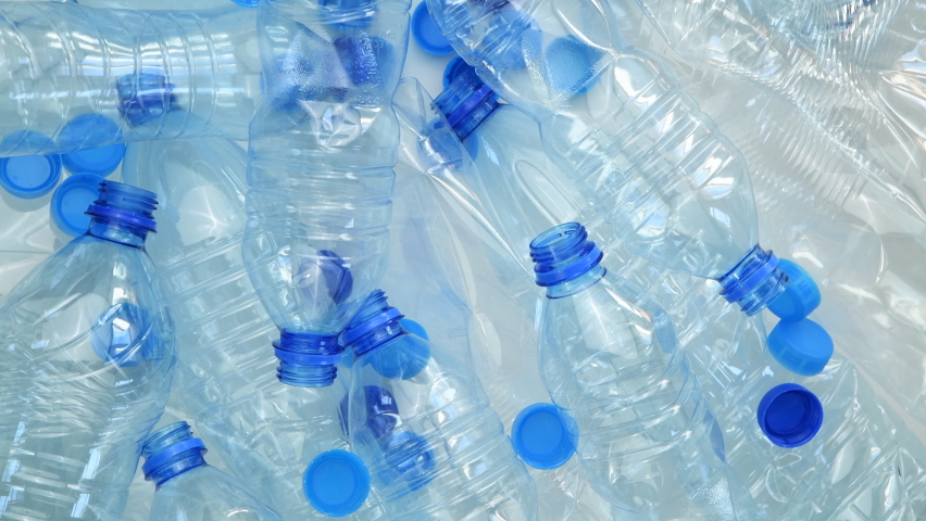 Plastic water bottles prepared for recycling | Shutterstock HD Video #1091385263