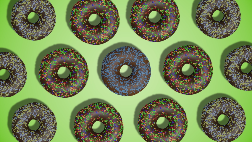 Delicious donuts with chololate icing cinemagraph rotation pattern on green abstract background. Simple motion design