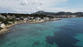 Aerial views from Moraira's coast. Drone video in Moraira, White Coast, Alicante, Spain. Les platgetes, Moraira. 
