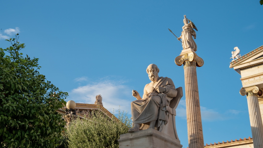 Statues of Plato and Athena time lapse in Academy of Athens during sunset