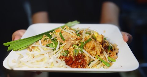 Close up fresh yummy delicious hot and spicy Pad Thai or stir-fried rice noodles, Thai traditional street food