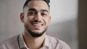 Dreaming arabic handsome young man agent worker deep in thoughts look away turn head at camera happy male human face friendly businessman millennial 20s guy smiling with toothy smile close up portrait - Powered by Shutterstock - Get 15% off with code: PIKWIZARD15