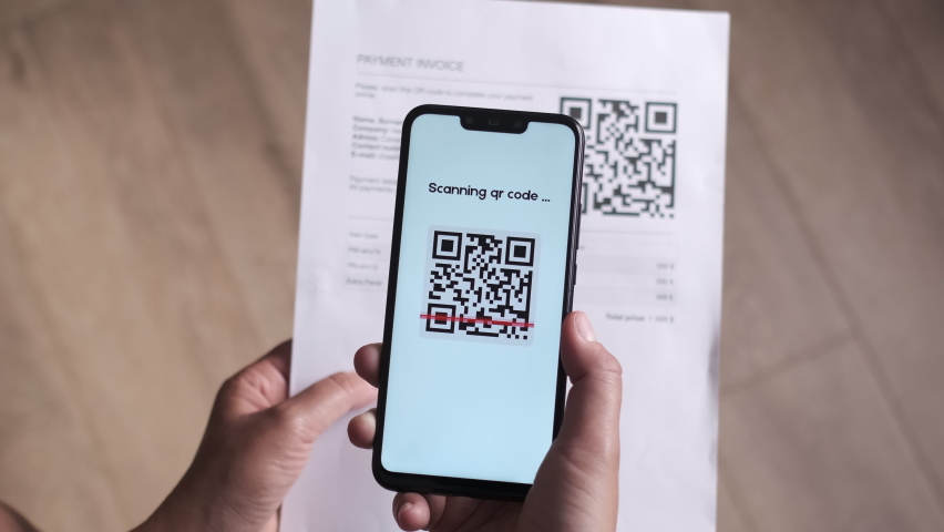 Using QR Code Scanner for Pay Online with Payment Invoice and QR Code or Barcode Reader on Smartphone Screen. Cashless Online Payment Concept. Pay Bill with QR Code. CloseUp POV View. | Shutterstock HD Video #1091412593