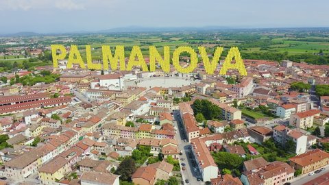 Inscription on video. Palmanova, Udine, Italy. An exemplary fortification project of its time was laid down in 1593. Knitted texture inscription, Aerial View, Point of interest