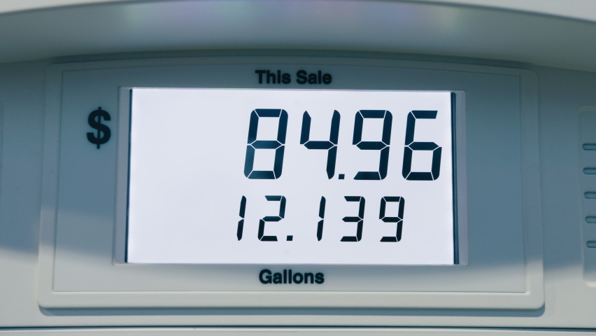 Gas price increase in CALIFORNIA USA Summer 2022. Fuel price rates goes up due to inflation and war in Ukraine. Gas prices reach all time highs at the pump. Digital screen counting refuel in dollars | Shutterstock HD Video #1091419635
