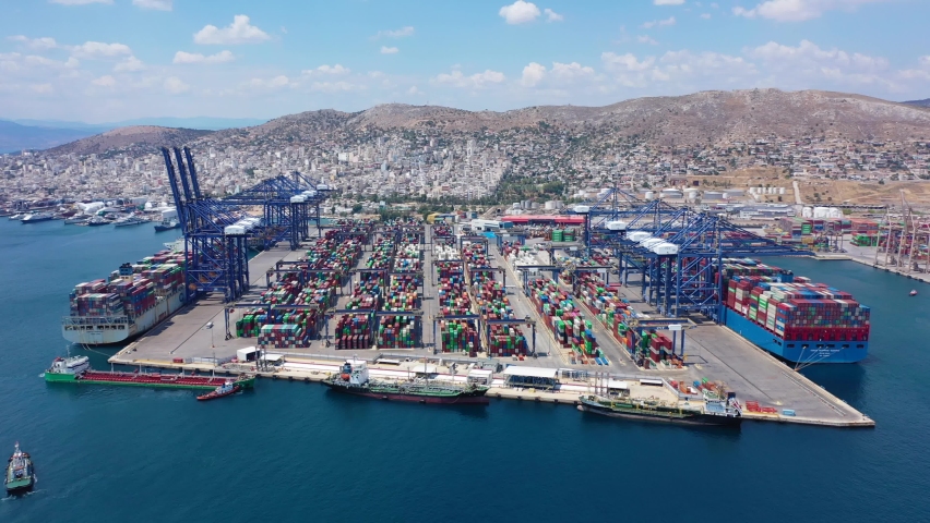 Aerial drone video of industrial loading - unloading logistics container terminal area of Perama, Piraeus port, Attica, Greece