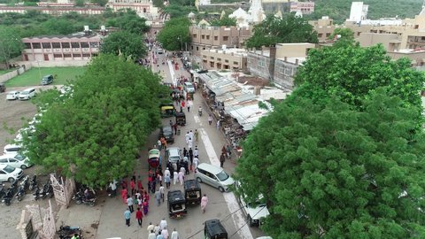 Palitana , Gujarat , India - 06 14 2022: Aerial shot of street of the Palitana temple . The Palitana temples of Jainism are located on Shatrunjaya hill by the city of Palitana in Bhavnagar district, G