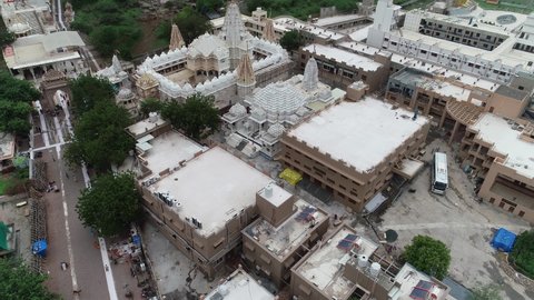 Palitana , Gujarat , India - 06 14 2022: Aerial shot of more than 900 temple of Palitana temple. 