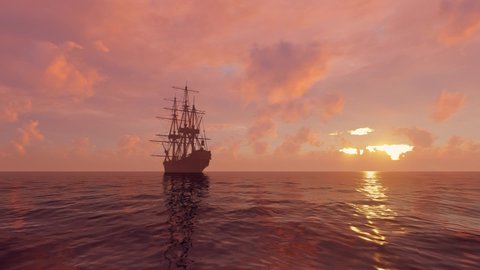 Sailing ship on the open sea at sunset