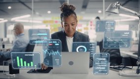 Female Project Manager Working on Computer in Office. Augmented Reality Corporate, Financial and Business App Icons Appear From Worker's Laptop. Productivity, Internet Connectivity and Online Concept. - Powered by Shutterstock - Get 15% off with code: PIKWIZARD15