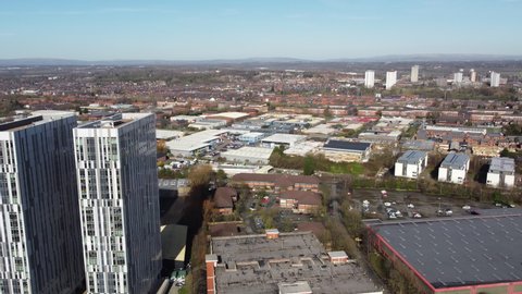 Salford Quays England. June 1, 2022. Aerial footage of buildings with views of Manchester City centre. 