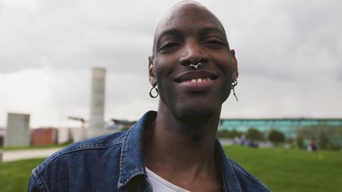 Happy African gay man celebrating pride festival - LGBTQ community concept – Video có sẵn