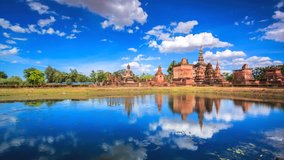 4K.Time lapse Landmark Wat Mahathat temple in Sukhothai historical park and the old town of Thailand. Thailand.Footage Video Ultra HD, 4096 x 2304 