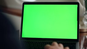 Closeup hand waving green laptop screen. Manager videocalling chroma key partner on airplane trip. Unknown businessman talking virtual conference saying hi. Wealthy ceo having online conversation. - Powered by Shutterstock - Get 15% off with code: PIKWIZARD15